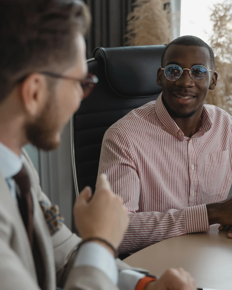 Two people talking during an office interview